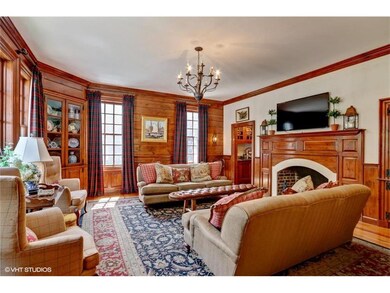 Warm and cozy wood paneled family room.