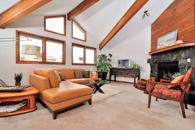Living Rm w/Vaulted Ceilings & Fireplace