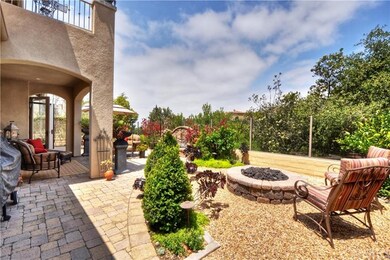 Enjoy those cool nights by this built in fire pit!