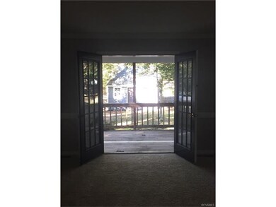 French Doors from living room to rear covered porc