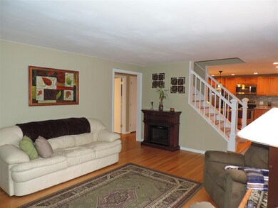 Living room opens to kitchen