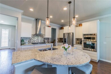 Kitchen features include granite counter-tops, upp