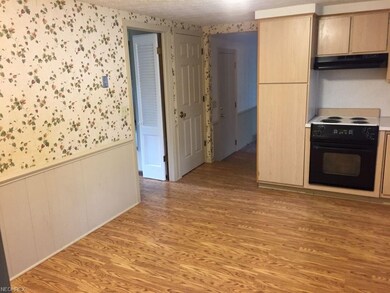 Another view of kitchen. Lots of room for a table 