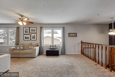 Main floor living room is bright and inviting with