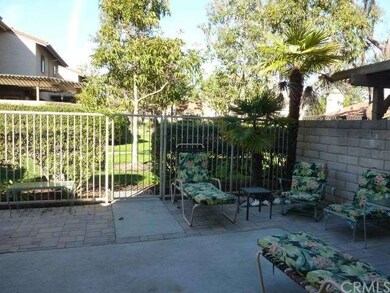 Spacious rear patio opens to greenbelt