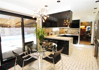 Eat in kitchen with quartz counter tops.