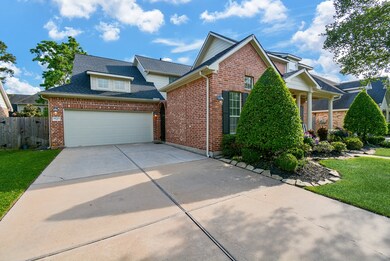 Wide driveway with three car tandem garage!