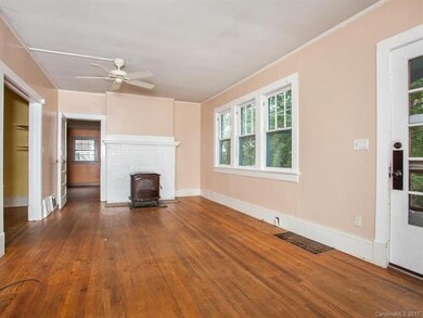 Living room - MBR door to left of wood stove