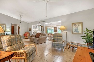 HUGE LIVING ROOM......HOUSE IS TILED THROUGHOUT