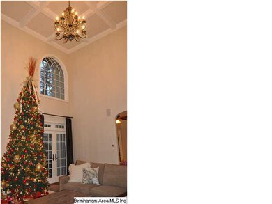 Living room features french doors that lead you to