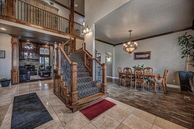 Stairs with wood-type flooring, a fireplace, a not