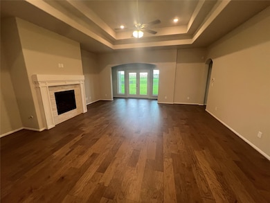Spacious great room with cozy fireplace