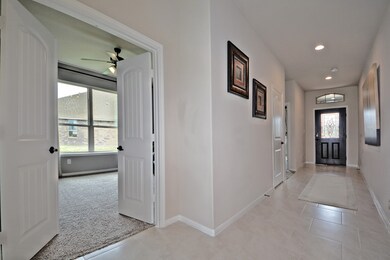 Wow! Double Doors Opens to your Wonderful Study or maybe that Home Office you may still need! Wonderful Place to call Home!**Photo is of the Bayfield Plan and is of the Model Home and the Actual Property Not Photographed.**