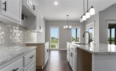 Photos provided depict previous model, design features may vary