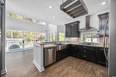 Kitchen featuring appliances with stainless steel 