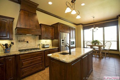 This custom kitchen  is functional and elegant. Gr
