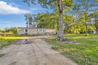 1027 County Road 3141 E, Cleveland, TX 77327 - photo 4