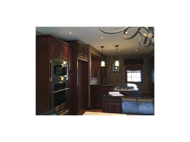 Builtin Microwave and Oven with warming drawer.