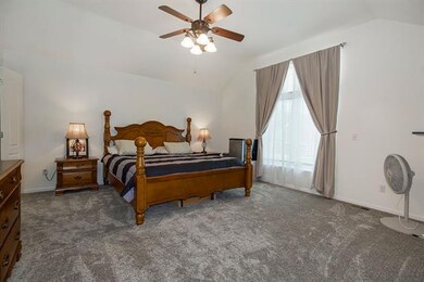 Master Bedroom w/ two walk-in closets.