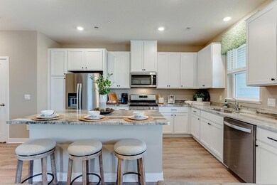 Beautiful 42' cabinets with hardware and granite countertops in every home. Image is of model, colors may vary.