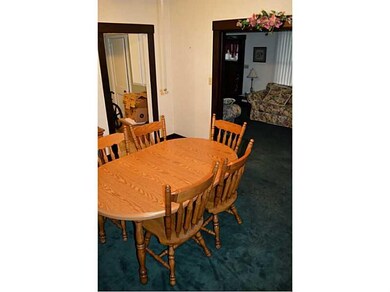 Dining Room. Wood trim, hardwood floors underneath