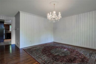 Gracious Dining Room with Lovely Chandelier and Me