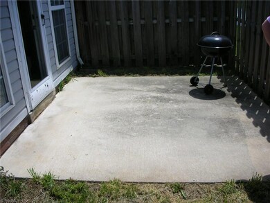 Patio area is approx. 10' x 10' square with access to home or backyard area.