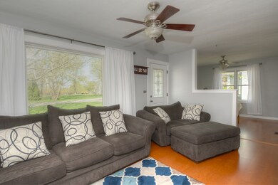 Spacious Living Room with Beautiful Views of the L