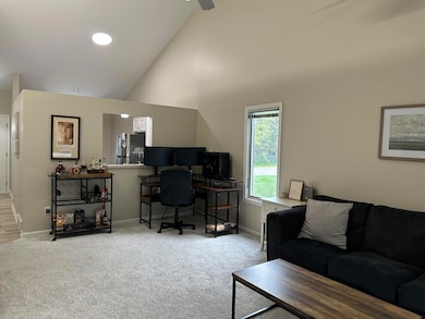 Living room looking toward kitchen