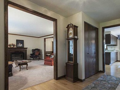 Entry/Foyer. Hardwood flooring, double door with a