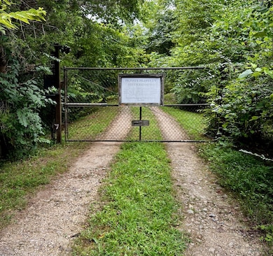 This property is down a private gravel road leading to the main gate. Private and Secure.