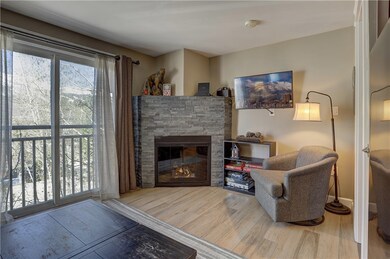 Cozy Wood Fireplace in Living Room
