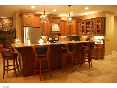 Cherry cabinetry, spacious eating bar
