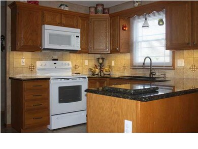 Stunning remodeled kitchen with granite counters, 