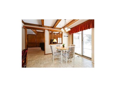 Breakfast area overlooks flagstone patio