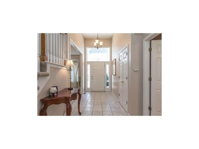 Welcoming Entryway with New Light Fixture