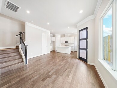Wood floors is standard in our living and dining a