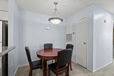 The living room is open to the dining area as well