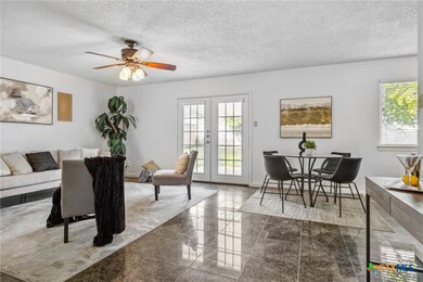 Livingroom with french doors to back yard