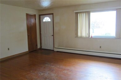 Living Room - this area was previously carpeted, b