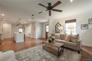 Living room with hardwood / wood-style floors, cei
