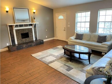 Open floor plan with high ceilings