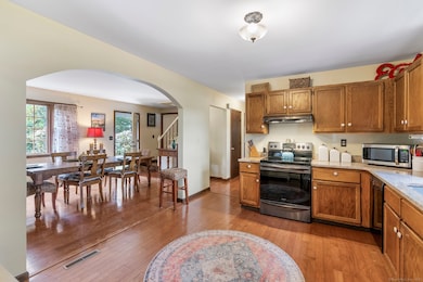 Granite counters. Opens to dining room