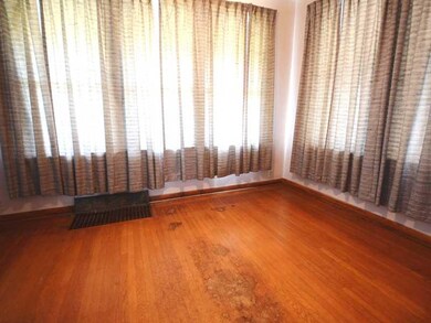 Den. Den/office/family room off the living room, h