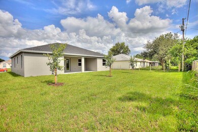 969 SW Mcdevitt Ave, Port Saint Lucie, FL 34953 - photo 2