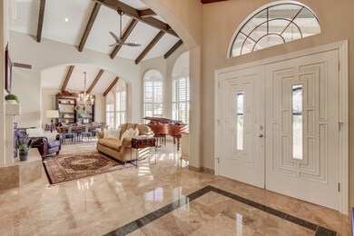 Foyer Open to Living Rm