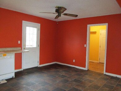 Breakfast Area shows view into Laundry