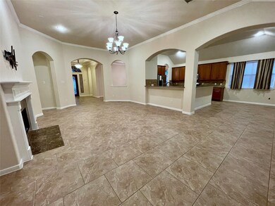 This spacious open-concept living area features a