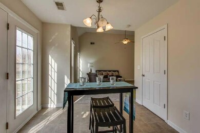 Double doors leading to deck ...