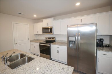 Kitchen. All appliances remain.